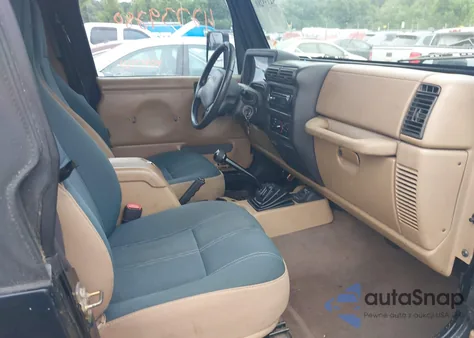 2001 Jeep Wrangler Sahara z USA, uszkodzony, nr VIN 1J4FA59S41P376079